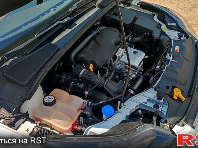 Форд Фокус 2013 в Харькове на Automoto.ua Белый Форд Фокус, объемом двигателя 1 л и пробегом 200 тыс. км за 5750 $, фото 8 на Automoto.ua