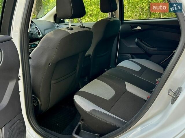 Білий Форд Фокус, об'ємом двигуна 1 л та пробігом 196 тис. км за 6100 $, фото 12 на Automoto.ua