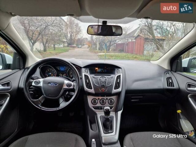 Белый Форд Фокус, объемом двигателя 1 л и пробегом 149 тыс. км за 5600 $, фото 12 на Automoto.ua