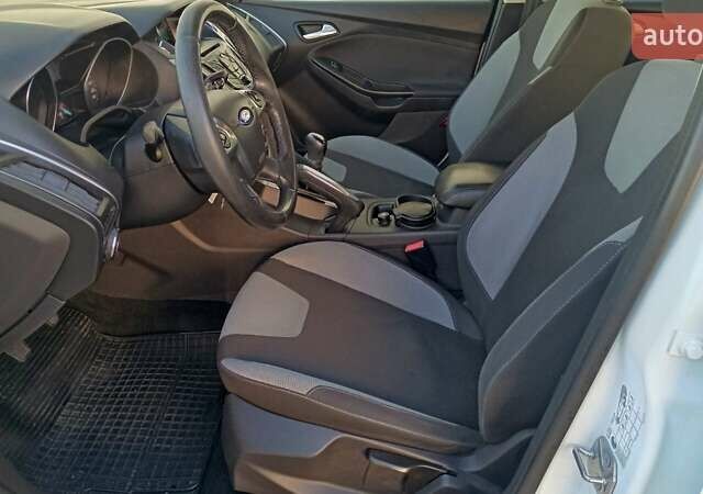 Білий Форд Фокус, об'ємом двигуна 1 л та пробігом 152 тис. км за 6630 $, фото 11 на Automoto.ua