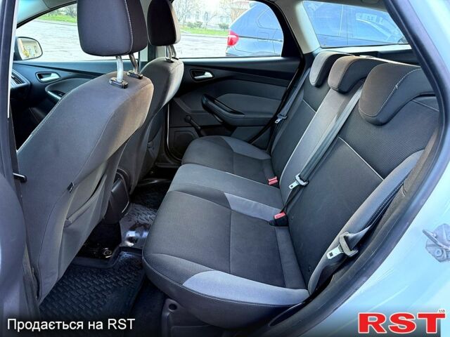 Білий Форд Фокус, об'ємом двигуна 1 л та пробігом 180 тис. км за 5850 $, фото 7 на Automoto.ua