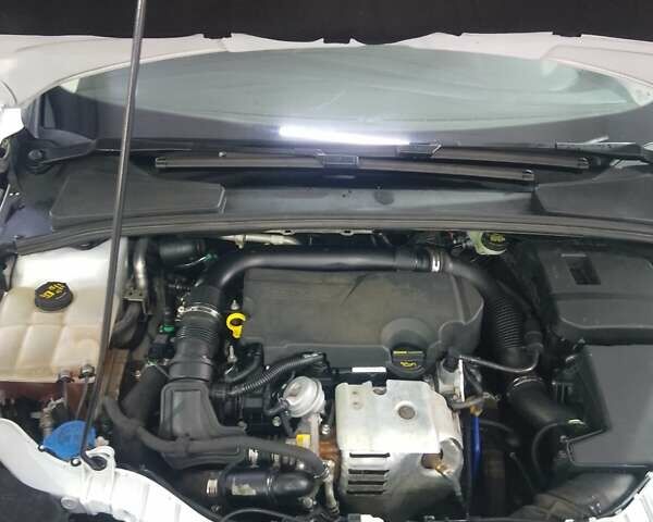 Белый Форд Фокус, объемом двигателя 1 л и пробегом 119 тыс. км за 5999 $, фото 8 на Automoto.ua