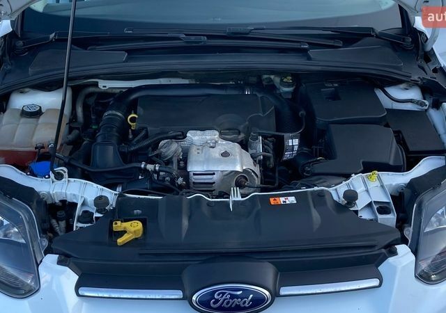 Белый Форд Фокус, объемом двигателя 1 л и пробегом 230 тыс. км за 6000 $, фото 8 на Automoto.ua