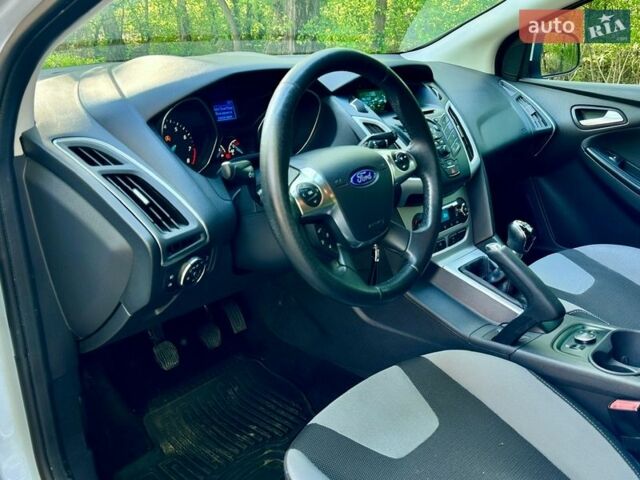 Білий Форд Фокус, об'ємом двигуна 1 л та пробігом 196 тис. км за 6100 $, фото 10 на Automoto.ua