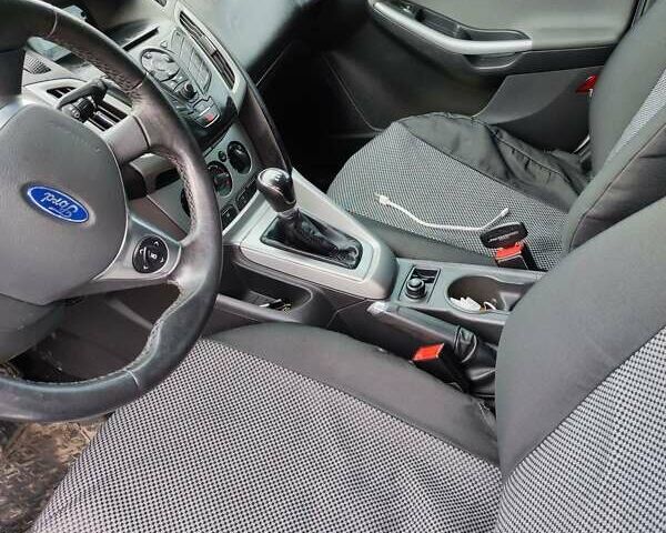 Белый Форд Фокус, объемом двигателя 1 л и пробегом 132 тыс. км за 6000 $, фото 6 на Automoto.ua