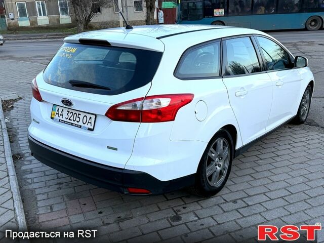 Білий Форд Фокус, об'ємом двигуна 1 л та пробігом 180 тис. км за 5850 $, фото 5 на Automoto.ua
