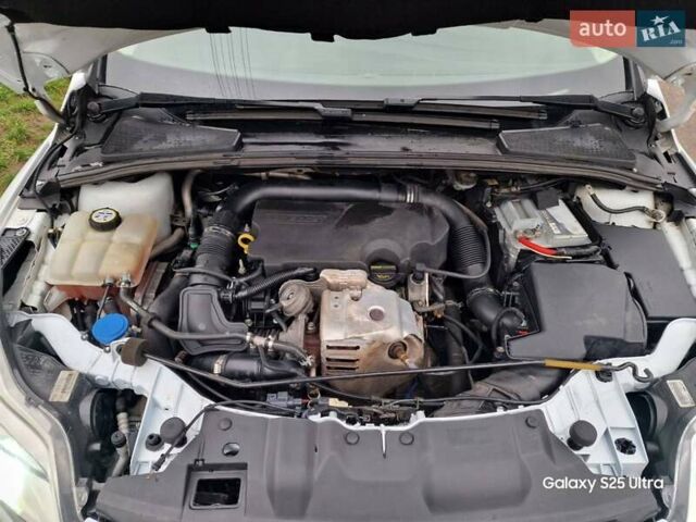 Белый Форд Фокус, объемом двигателя 1 л и пробегом 149 тыс. км за 5600 $, фото 11 на Automoto.ua