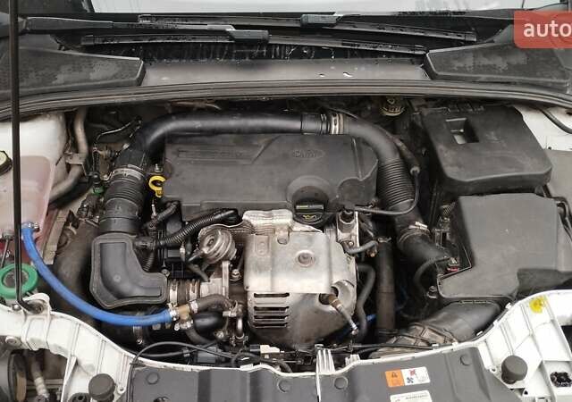 Білий Форд Фокус, об'ємом двигуна 1 л та пробігом 188 тис. км за 6600 $, фото 21 на Automoto.ua