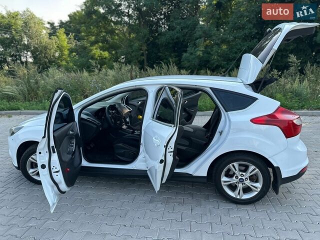 Білий Форд Фокус, об'ємом двигуна 1 л та пробігом 185 тис. км за 4990 $, фото 12 на Automoto.ua