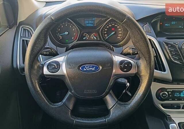 Білий Форд Фокус, об'ємом двигуна 1 л та пробігом 152 тис. км за 6630 $, фото 12 на Automoto.ua