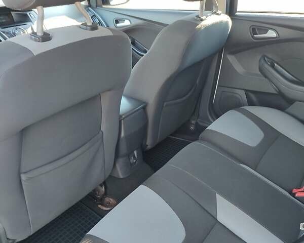 Белый Форд Фокус, объемом двигателя 1 л и пробегом 166 тыс. км за 6300 $, фото 14 на Automoto.ua