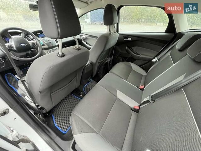 Білий Форд Фокус, об'ємом двигуна 1 л та пробігом 198 тис. км за 7400 $, фото 10 на Automoto.ua