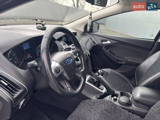 Білий Форд Фокус, об'ємом двигуна 1 л та пробігом 160 тис. км за 5990 $, фото 25 на Automoto.ua