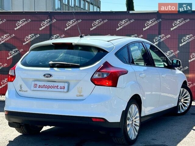 Белый Форд Фокус, объемом двигателя 1 л и пробегом 172 тыс. км за 6000 $, фото 6 на Automoto.ua