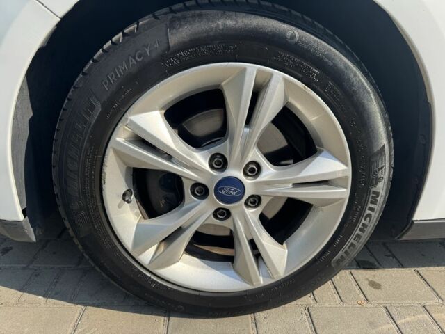 Белый Форд Фокус, объемом двигателя 1 л и пробегом 228 тыс. км за 6000 $, фото 13 на Automoto.ua