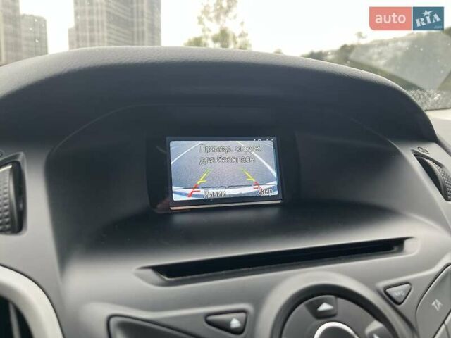 Білий Форд Фокус, об'ємом двигуна 1 л та пробігом 198 тис. км за 7400 $, фото 9 на Automoto.ua