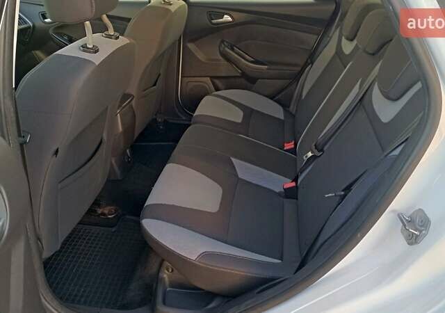 Білий Форд Фокус, об'ємом двигуна 1 л та пробігом 152 тис. км за 6630 $, фото 10 на Automoto.ua