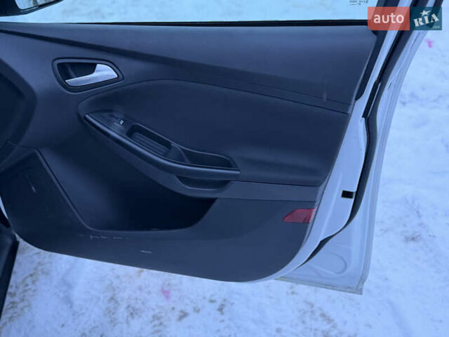Білий Форд Фокус, об'ємом двигуна 1 л та пробігом 55 тис. км за 7900 $, фото 15 на Automoto.ua