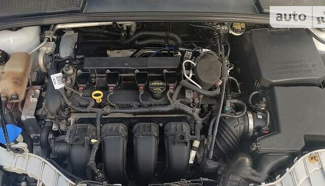 Білий Форд Фокус, об'ємом двигуна 2 л та пробігом 188 тис. км за 7900 $, фото 31 на Automoto.ua