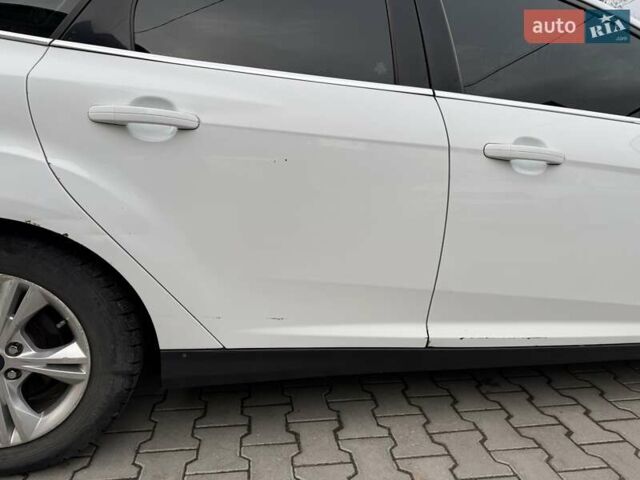 Белый Форд Фокус, объемом двигателя 1 л и пробегом 163 тыс. км за 5900 $, фото 4 на Automoto.ua