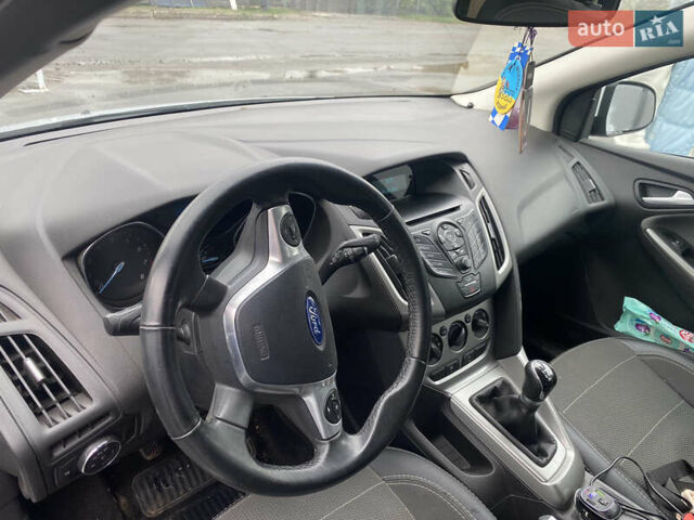 Белый Форд Фокус, объемом двигателя 1 л и пробегом 115 тыс. км за 8000 $, фото 7 на Automoto.ua
