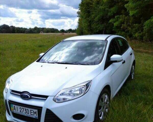 Білий Форд Фокус, об'ємом двигуна 1 л та пробігом 70 тис. км за 9500 $, фото 12 на Automoto.ua