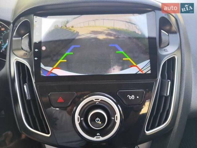 Белый Форд Фокус, объемом двигателя 2 л и пробегом 163 тыс. км за 7999 $, фото 24 на Automoto.ua