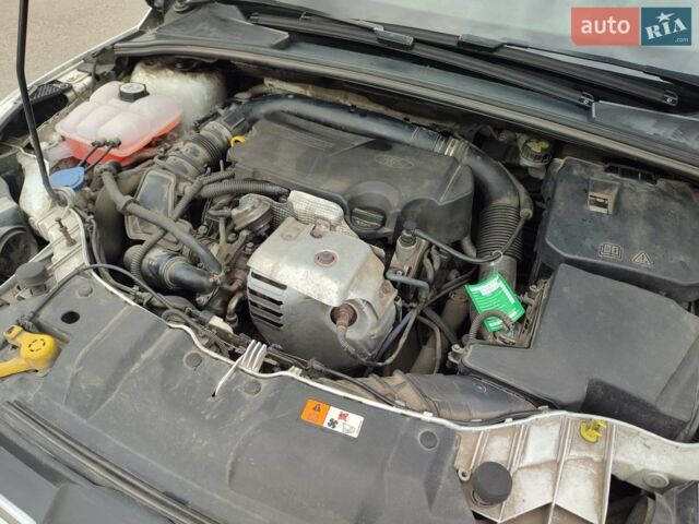 Білий Форд Фокус, об'ємом двигуна 1 л та пробігом 186 тис. км за 7700 $, фото 9 на Automoto.ua