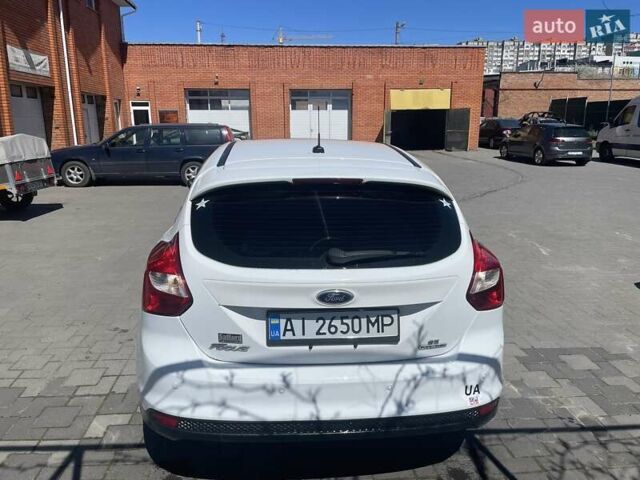 Форд Фокус 2014 в Хмельницком на Automoto.ua Белый Форд Фокус, объемом двигателя 2 л и пробегом 206 тыс. км за 7999 $, фото 10 на Automoto.ua