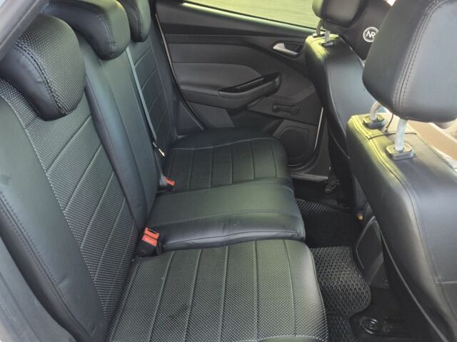 Белый Форд Фокус, объемом двигателя 1 л и пробегом 174 тыс. км за 6800 $, фото 6 на Automoto.ua