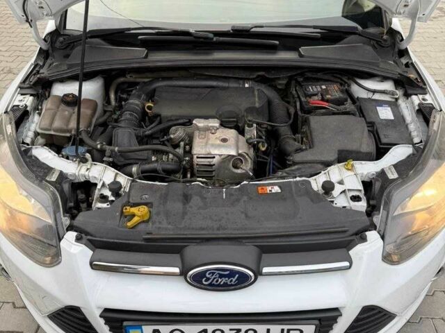 Білий Форд Фокус, об'ємом двигуна 1 л та пробігом 165 тис. км за 5500 $, фото 13 на Automoto.ua