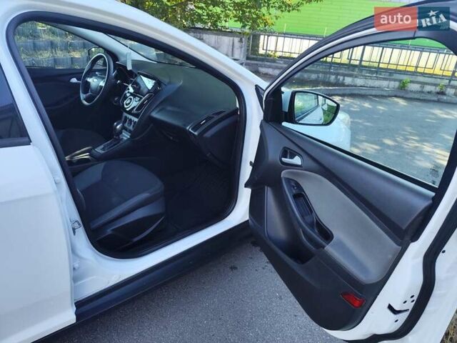 Белый Форд Фокус, объемом двигателя 2 л и пробегом 163 тыс. км за 7999 $, фото 12 на Automoto.ua