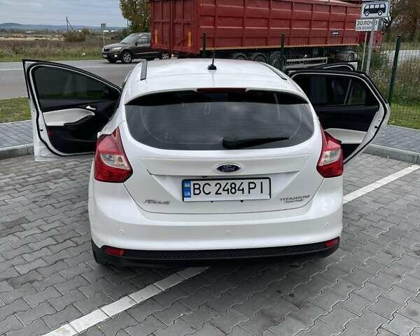 Форд Фокус 2014 в Золочев на Automoto.ua Белый Форд Фокус, объемом двигателя 2 л и пробегом 146 тыс. км за 8399 $, фото 7 на Automoto.ua