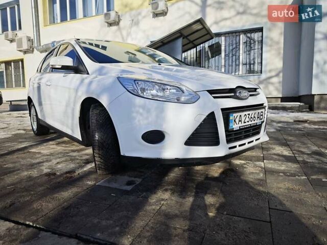 Белый Форд Фокус, объемом двигателя 1 л и пробегом 147 тыс. км за 6100 $, фото 1 на Automoto.ua