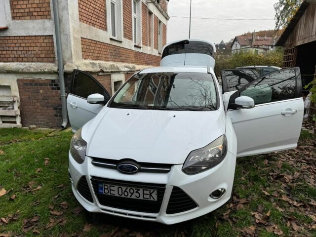 Білий Форд Фокус, об'ємом двигуна 1 л та пробігом 135 тис. км за 6002 $, фото 6 на Automoto.ua
