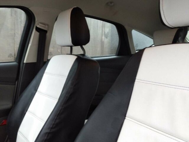 Білий Форд Фокус, об'ємом двигуна 1 л та пробігом 70 тис. км за 9500 $, фото 9 на Automoto.ua