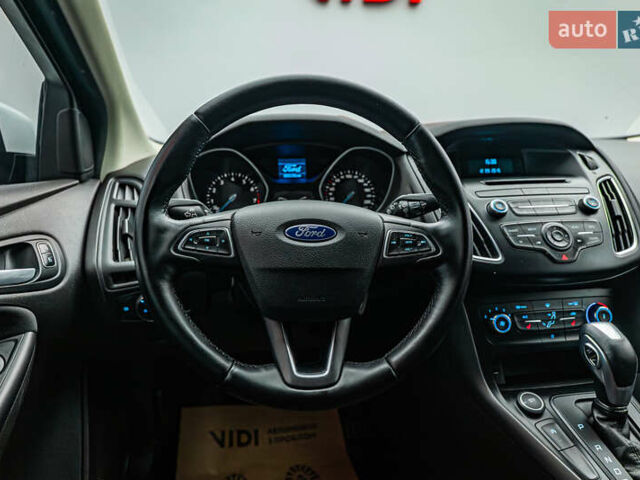 Білий Форд Фокус, об'ємом двигуна 1 л та пробігом 88 тис. км за 9788 $, фото 11 на Automoto.ua