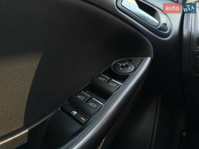 Белый Форд Фокус, объемом двигателя 1 л и пробегом 150 тыс. км за 8290 $, фото 15 на Automoto.ua