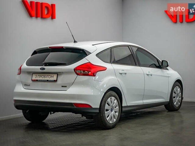 Білий Форд Фокус, об'ємом двигуна 1 л та пробігом 88 тис. км за 9788 $, фото 1 на Automoto.ua
