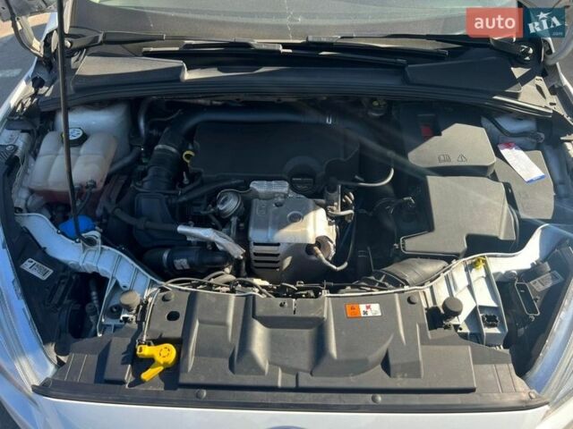 Белый Форд Фокус, объемом двигателя 1 л и пробегом 114 тыс. км за 6900 $, фото 28 на Automoto.ua