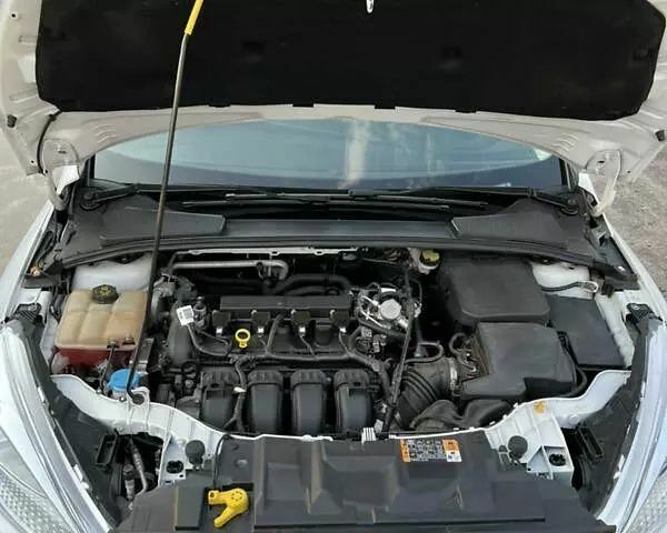 Білий Форд Фокус, об'ємом двигуна 2 л та пробігом 186 тис. км за 4350 $, фото 12 на Automoto.ua