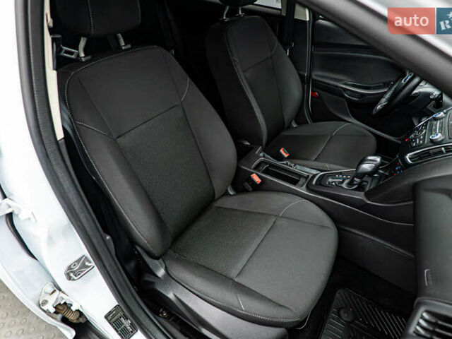 Білий Форд Фокус, об'ємом двигуна 1 л та пробігом 88 тис. км за 9788 $, фото 14 на Automoto.ua