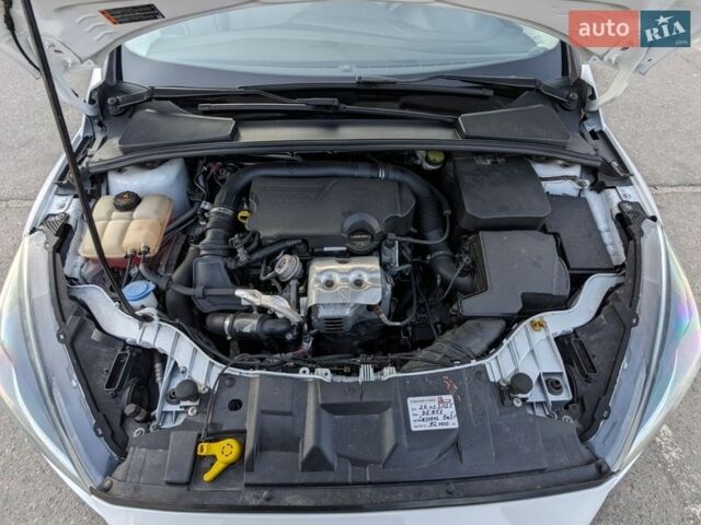 Білий Форд Фокус, об'ємом двигуна 1 л та пробігом 90 тис. км за 7300 $, фото 28 на Automoto.ua