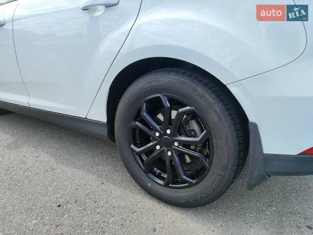 Белый Форд Фокус, объемом двигателя 1 л и пробегом 69 тыс. км за 8399 $, фото 13 на Automoto.ua