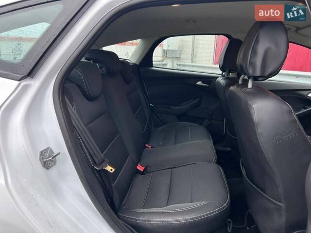 Белый Форд Фокус, объемом двигателя 1 л и пробегом 122 тыс. км за 9290 $, фото 11 на Automoto.ua