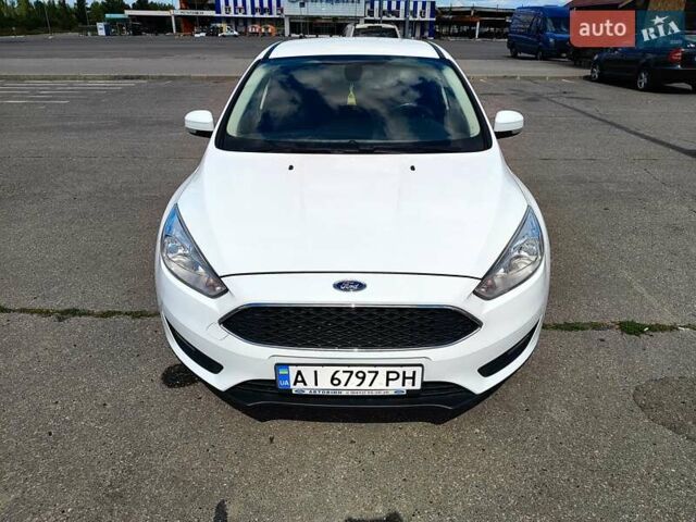 Белый Форд Фокус, объемом двигателя 1 л и пробегом 69 тыс. км за 8399 $, фото 7 на Automoto.ua