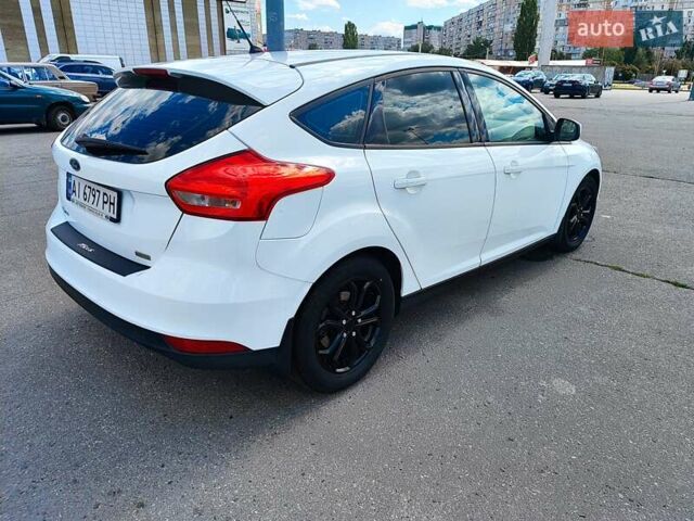 Белый Форд Фокус, объемом двигателя 1 л и пробегом 69 тыс. км за 8399 $, фото 6 на Automoto.ua