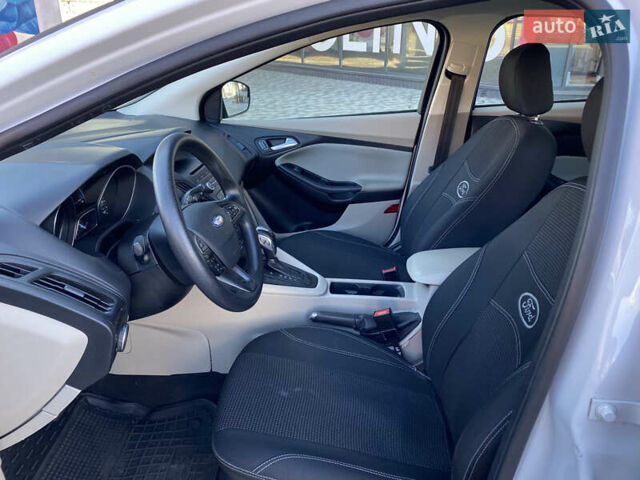 Білий Форд Фокус, об'ємом двигуна 2 л та пробігом 163 тис. км за 8550 $, фото 17 на Automoto.ua
