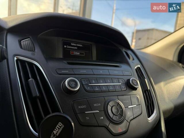 Белый Форд Фокус, объемом двигателя 1 л и пробегом 150 тыс. км за 8290 $, фото 18 на Automoto.ua