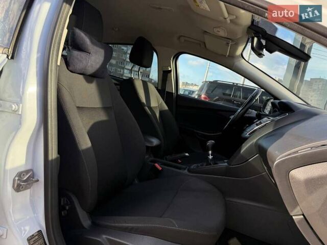 Белый Форд Фокус, объемом двигателя 1 л и пробегом 150 тыс. км за 8290 $, фото 11 на Automoto.ua